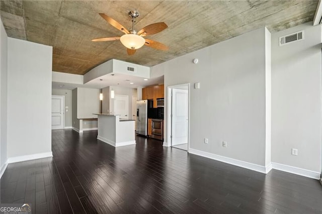 950 W Peachtree St NW Unit 1613, Atlanta, GA 30309 - unfurnished living room with a ceiling fan, dark wood finished floors, and baseboards