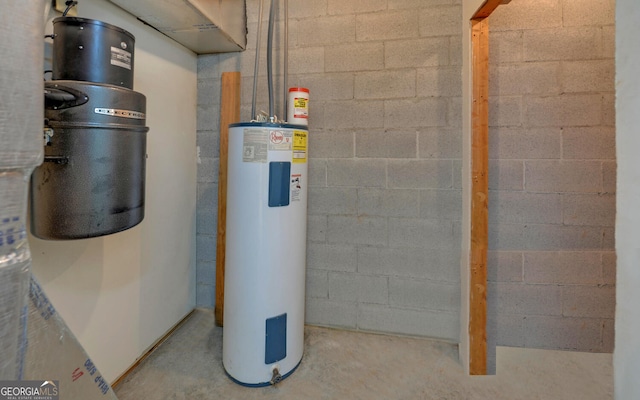 utility room featuring electric water heater