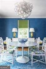 dining space featuring a chandelier