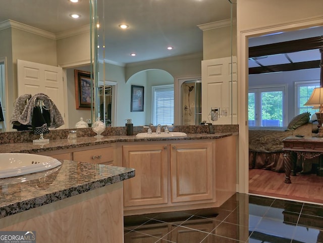 205 Somerset Ct, Mcdonough, GA 30253 - bathroom featuring ornamental molding, double vanity, granite tiled floors, and recessed lighting