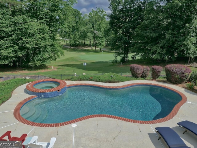 205 Somerset Ct, Mcdonough, GA 30253 - view of pool with a pool with connected hot tub, view of wooded area, and a patio area