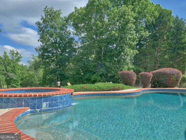 205 Somerset Ct, Mcdonough, GA 30253 - view of pool featuring a pool with connected hot tub