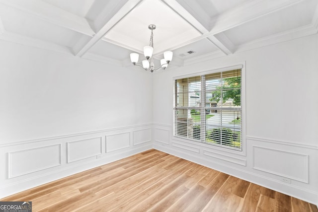 3805 Alden Pl, Cumming, GA 30028 - spare room with a chandelier, coffered ceiling, beamed ceiling, light wood-style floors, and wainscoting