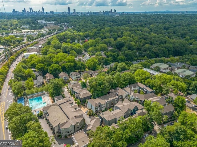 262 Southerland Ter NE, Atlanta, GA 30307 - aerial perspective of suburban area with skyline and a pool area