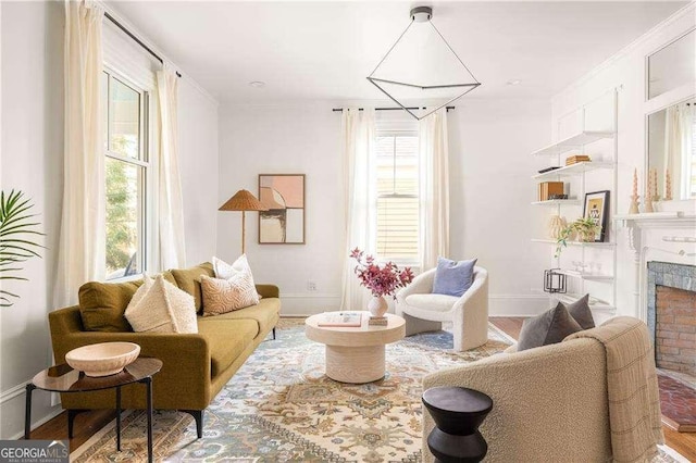 629 Hansell St SE, Atlanta, GA 30312 - living room with healthy amount of natural light, a fireplace, baseboards, and wood finished floors