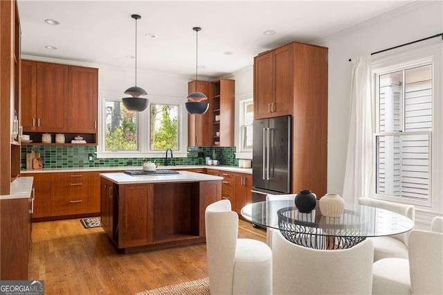629 Hansell St SE, Atlanta, GA 30312 - kitchen with appliances with stainless steel finishes, brown cabinetry, open shelves, and recessed lighting