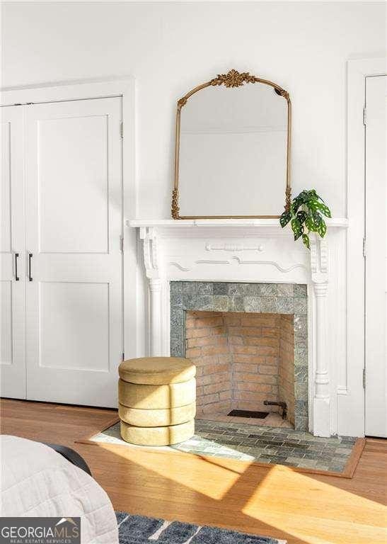 629 Hansell St SE, Atlanta, GA 30312 - detailed view of wood finished floors and a tile fireplace