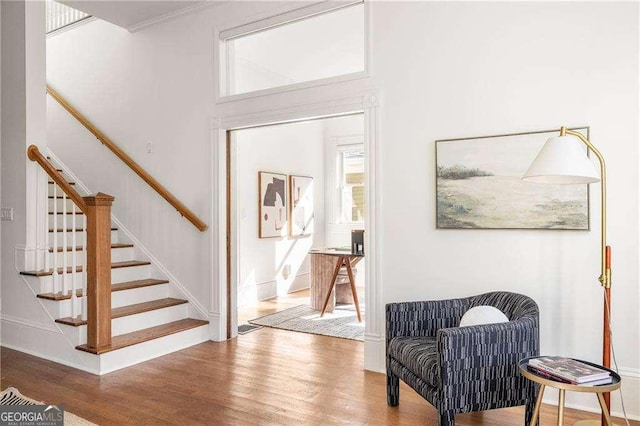 629 Hansell St SE, Atlanta, GA 30312 - living area featuring wood finished floors, stairway, and baseboards