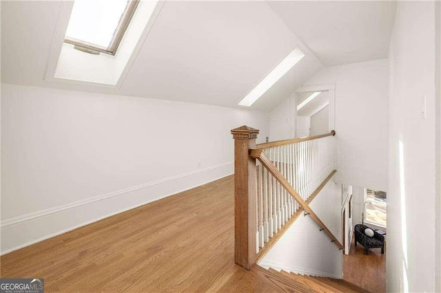 629 Hansell St SE, Atlanta, GA 30312 - bonus room with a skylight, lofted ceiling, and wood finished floors