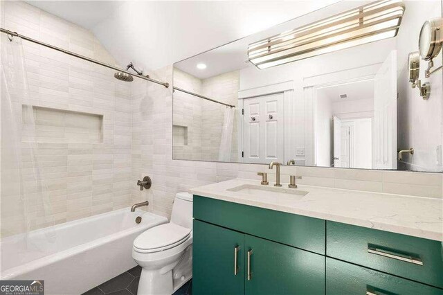 629 Hansell St SE, Atlanta, GA 30312 - bathroom with tile patterned flooring, shower / bath combination with curtain, toilet, and vanity