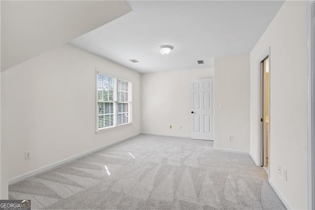 unfurnished bedroom with carpet flooring and baseboards
