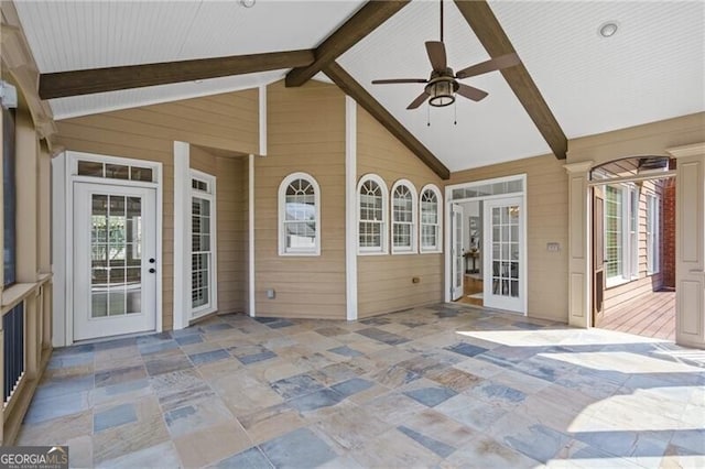 unfurnished sunroom with plenty of natural light and french doors