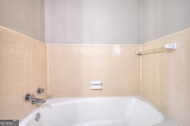 707 E Spring St, Monroe, GA 30655 - bathroom featuring a tub
