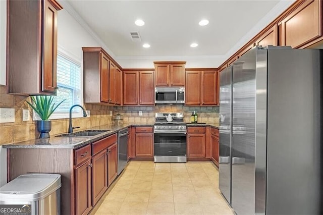 5711 Keys Way, Lithonia, GA 30058 - kitchen featuring stainless steel appliances, a sink, dark stone countertops, backsplash, and recessed lighting