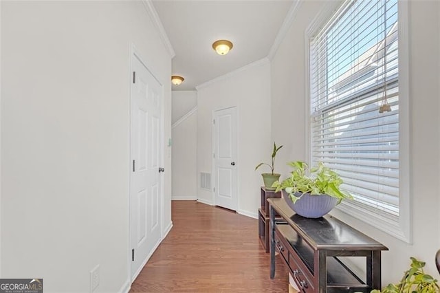 5711 Keys Way, Lithonia, GA 30058 - hall featuring crown molding, wood finished floors, and baseboards