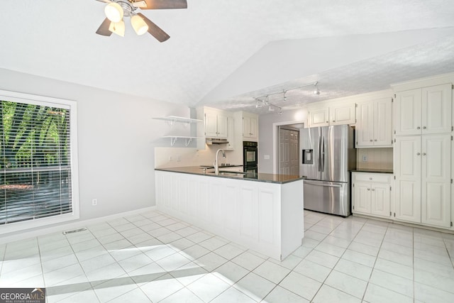 175 River Run, Roswell, GA 30075 - kitchen with stainless steel fridge with ice dispenser, dark countertops, open shelves, a peninsula, and light tile patterned flooring