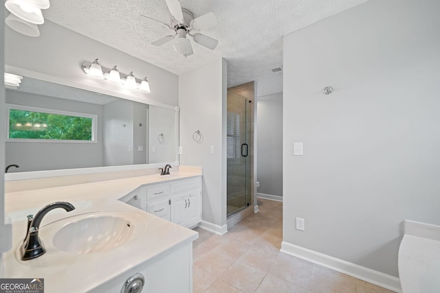 175 River Run, Roswell, GA 30075 - bathroom featuring double vanity, a stall shower, tile patterned flooring, a ceiling fan, and baseboards