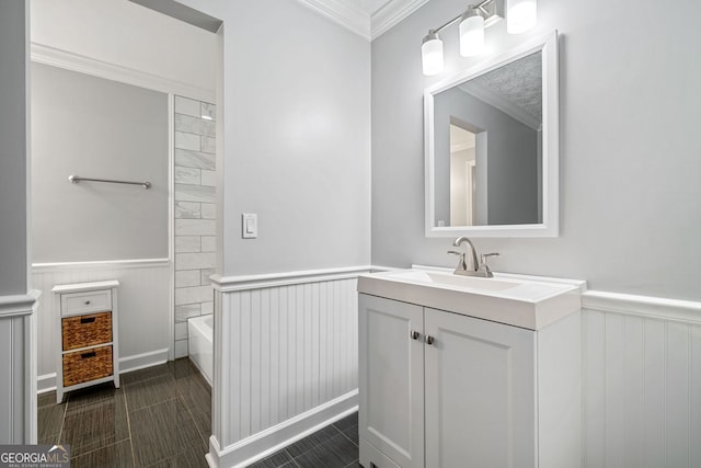 175 River Run, Roswell, GA 30075 - bathroom featuring wainscoting, vanity, ornamental molding, and washtub / shower combination