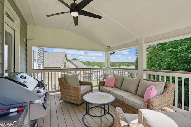 deck with an outdoor hangout area, area for grilling, and a ceiling fan