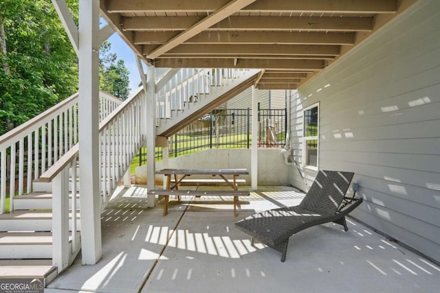 view of patio featuring stairs