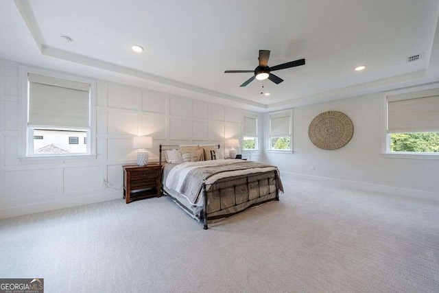 4992 Concert Ln, Marietta, GA 30066 - bedroom with a tray ceiling, light carpet, a decorative wall, recessed lighting, and a ceiling fan