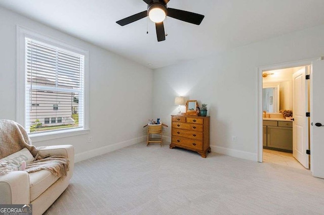 4992 Concert Ln, Marietta, GA 30066 - living area featuring light colored carpet, baseboards, and a ceiling fan