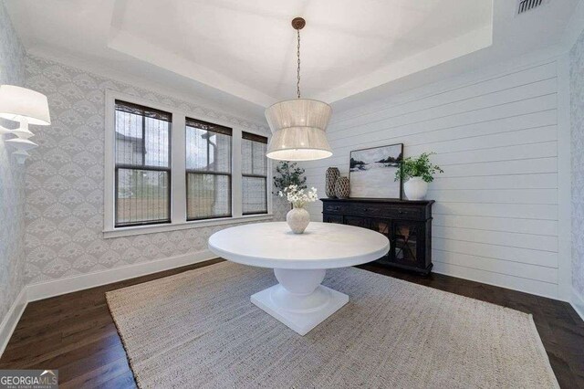4992 Concert Ln, Marietta, GA 30066 - dining area featuring a tray ceiling, dark wood-style floors, baseboards, and wallpapered walls