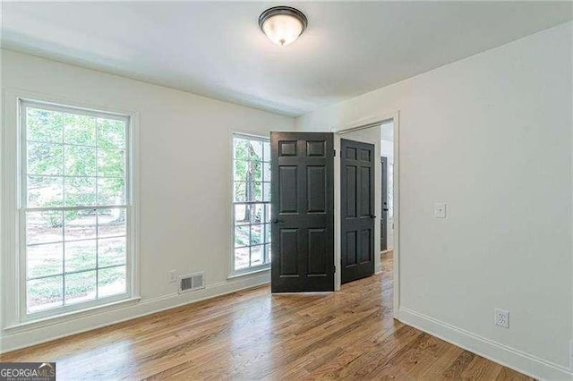 418 Mockingbird Ln, Smyrna, GA 30082 - foyer entrance with baseboards and wood finished floors