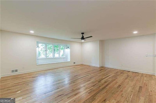 418 Mockingbird Ln, Smyrna, GA 30082 - empty room featuring ceiling fan, wood finished floors, recessed lighting, and baseboards