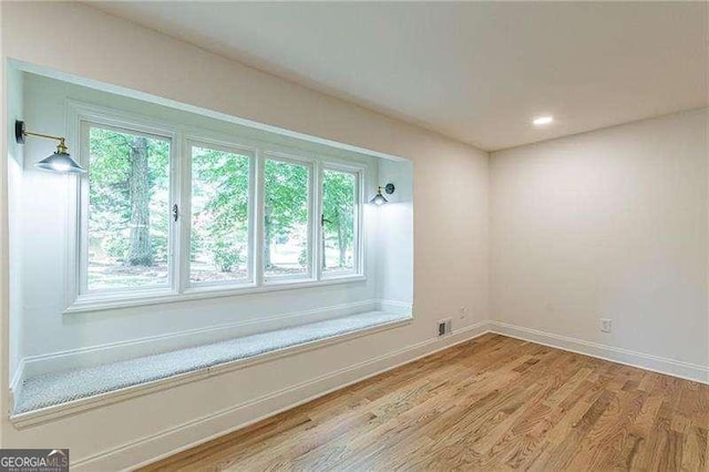 418 Mockingbird Ln, Smyrna, GA 30082 - unfurnished room with healthy amount of natural light, light wood-style floors, baseboards, and recessed lighting