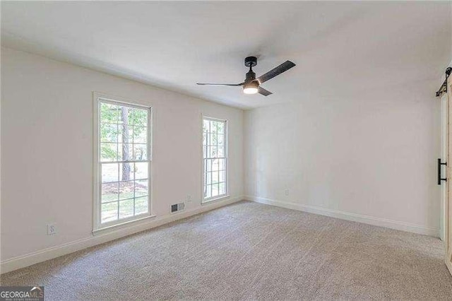 418 Mockingbird Ln, Smyrna, GA 30082 - carpeted empty room featuring a ceiling fan and baseboards