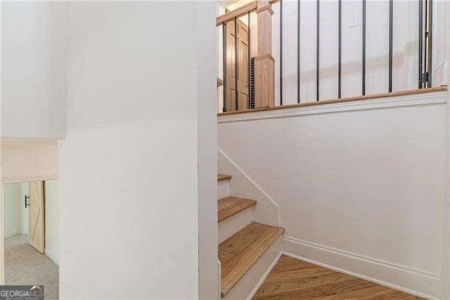 418 Mockingbird Ln, Smyrna, GA 30082 - staircase featuring baseboards