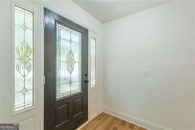 418 Mockingbird Ln, Smyrna, GA 30082 - foyer entrance with wood finished floors and baseboards