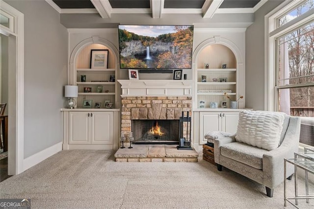 1525 Camden Cove Dr, Cumming, GA 30040 - living room with beam ceiling, ornamental molding, a warm lit fireplace, carpet, and baseboards