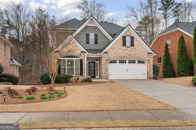 1525 Camden Cove Dr, Cumming, GA 30040 - craftsman-style home with concrete driveway, brick siding, a standing seam roof, and an attached garage