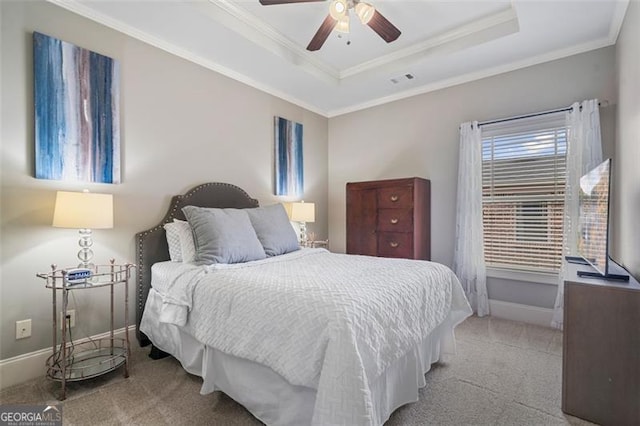 1525 Camden Cove Dr, Cumming, GA 30040 - bedroom featuring carpet flooring, baseboards, ornamental molding, a tray ceiling, and ceiling fan