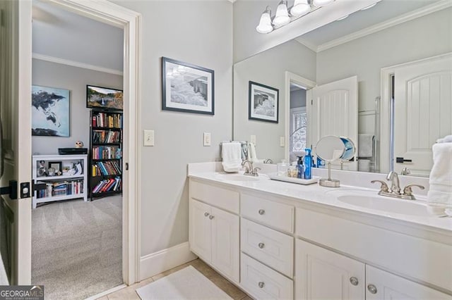 1525 Camden Cove Dr, Cumming, GA 30040 - bathroom featuring ornamental molding, double vanity, and baseboards