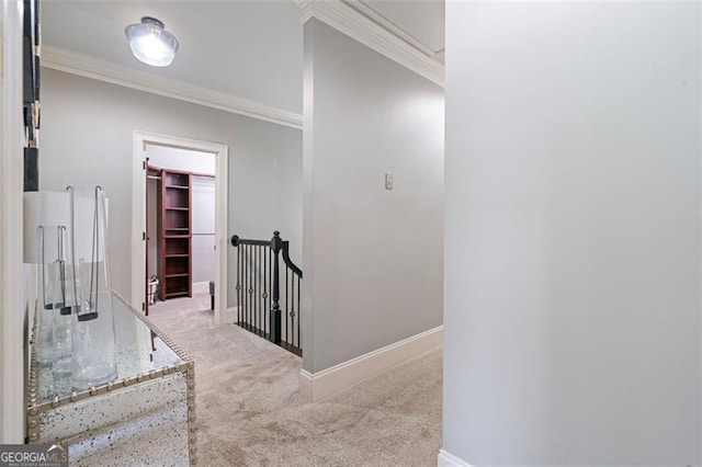 1525 Camden Cove Dr, Cumming, GA 30040 - hall featuring carpet floors, an upstairs landing, crown molding, baseboards, and attic access