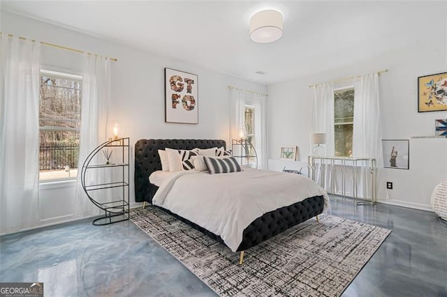 1525 Camden Cove Dr, Cumming, GA 30040 - bedroom featuring concrete floors and baseboards