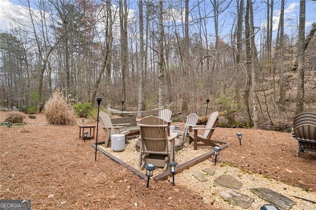 1525 Camden Cove Dr, Cumming, GA 30040 - view of yard featuring an outdoor fire pit