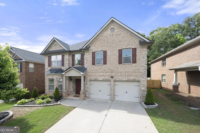 1181 Gateview Dr, Lawrenceville, GA 30046 - view of front of house featuring brick siding, concrete driveway, and a garage