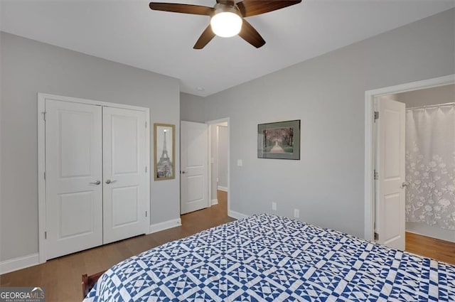 541 Glen Abbey Cir, Mableton, GA 30126 - bedroom with wood finished floors, a closet, a ceiling fan, and baseboards