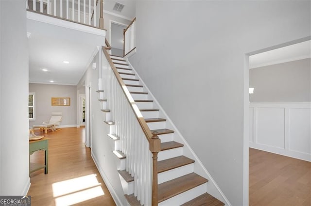 541 Glen Abbey Cir, Mableton, GA 30126 - stairs with ornamental molding, wood finished floors, and recessed lighting