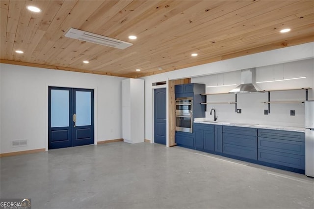 541 Glen Abbey Cir, Mableton, GA 30126 - interior space with open shelves, wooden ceiling, stainless steel double oven, blue cabinets, and wall chimney range hood