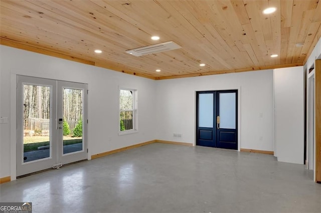 541 Glen Abbey Cir, Mableton, GA 30126 - empty room featuring wooden ceiling, french doors, recessed lighting, baseboards, and finished concrete flooring