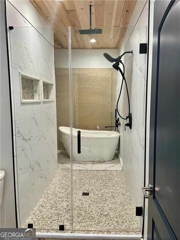 541 Glen Abbey Cir, Mableton, GA 30126 - bathroom with a stall shower, marble finish flooring, wood ceiling, and toilet