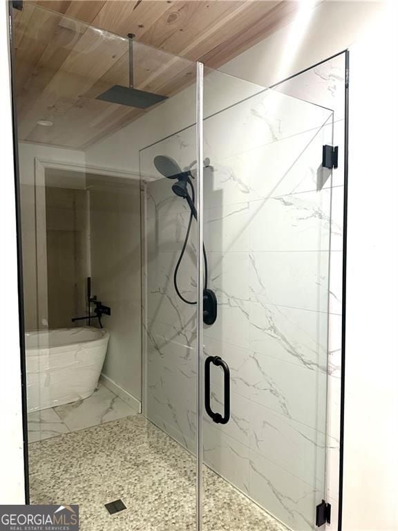 541 Glen Abbey Cir, Mableton, GA 30126 - bathroom with marble finish flooring, a marble finish shower, wood ceiling, and a freestanding bath