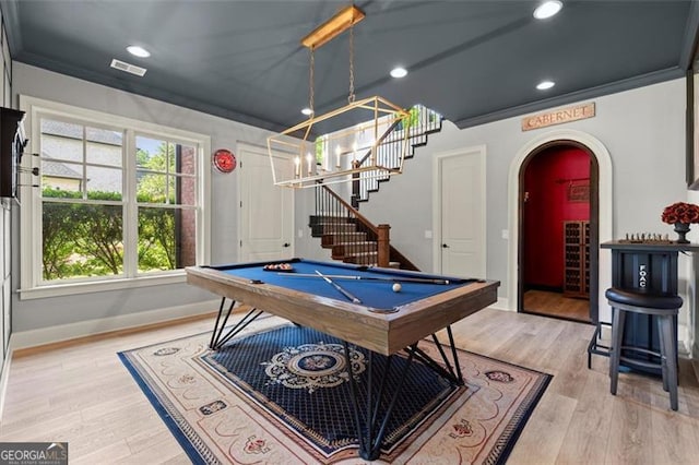 rec room with arched walkways, baseboards, plenty of natural light, billiards table, and recessed lighting
