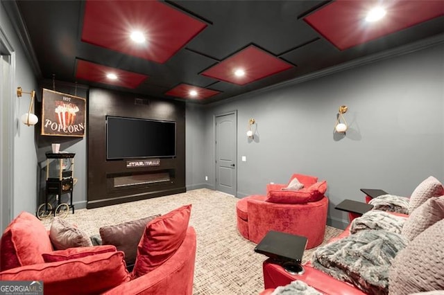 carpeted cinema with ornamental molding, baseboards, and recessed lighting