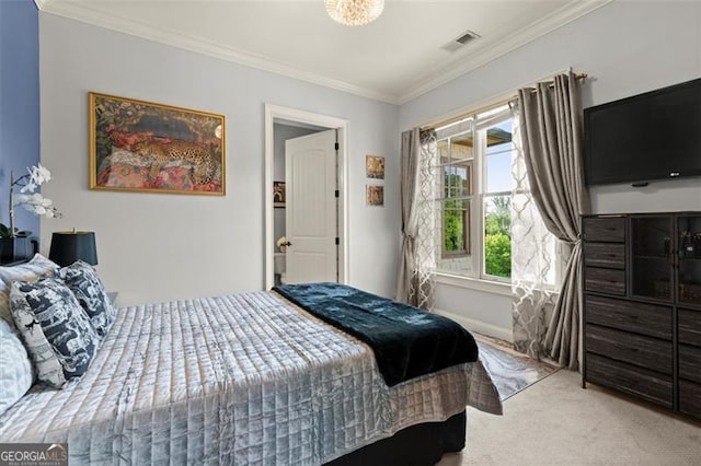 carpeted bedroom with crown molding